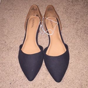 Black and brown leather pointed-toe flats